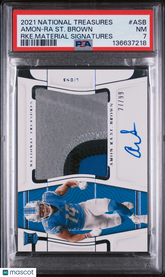 2021 National Treasures Rookie Material Signatures Amon-Ra ST. Brown /99 PSA 7